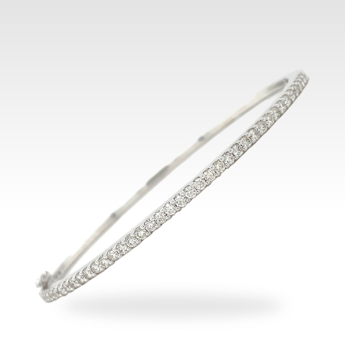 Regal 50% Round Diamond Bangle in 18ct white gold