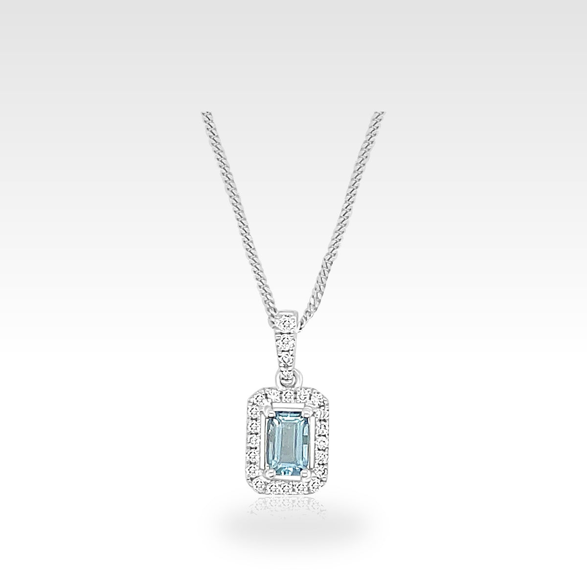 18ct Topaz Emerald Halo Necklace with natural diamonds