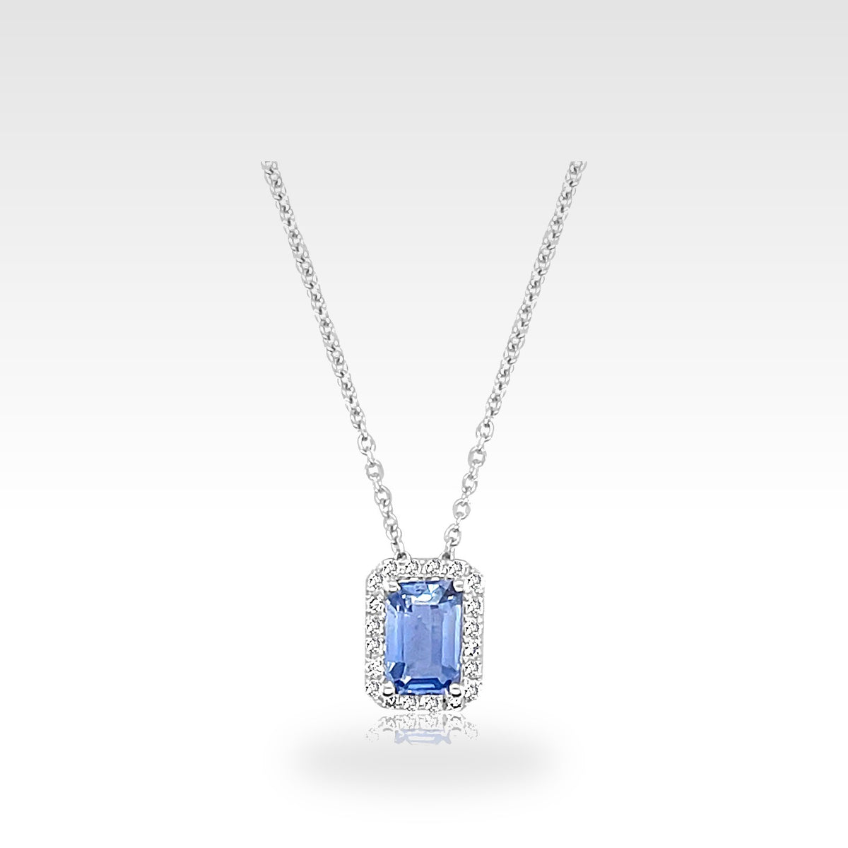 18ct Blue Topaz Necklace in 18ct gold with emerald and emerald natural diamonds