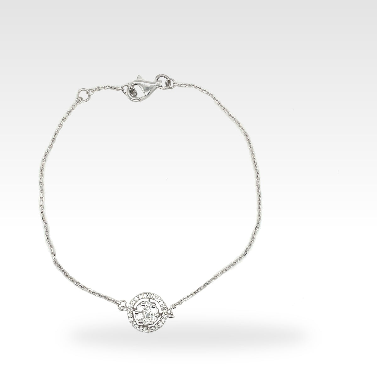 Round Gap Halo Bracelet in 14ct white gold with diamonds