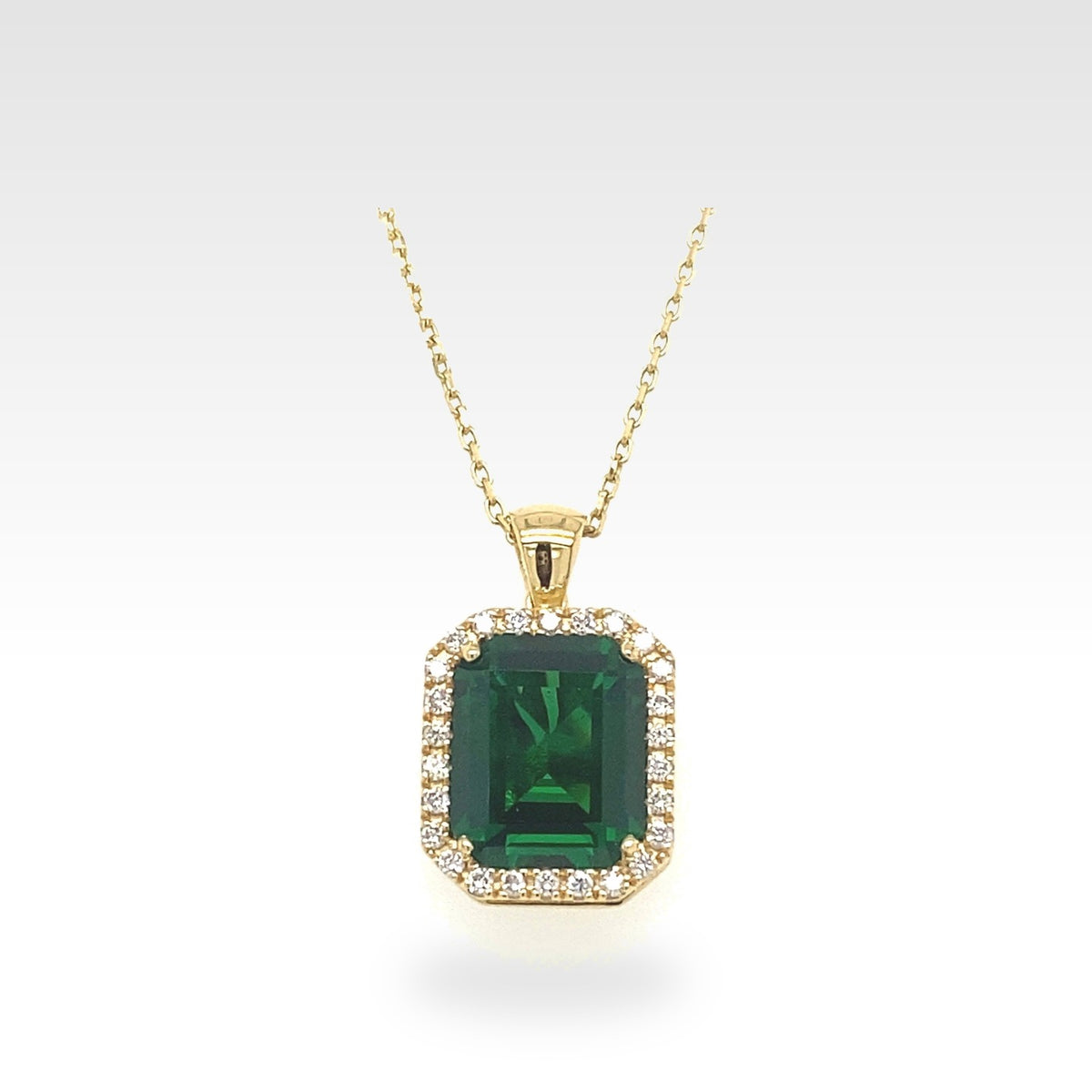 Rainbow Yellow Gold & Green Gemstone Pendant with diamonds