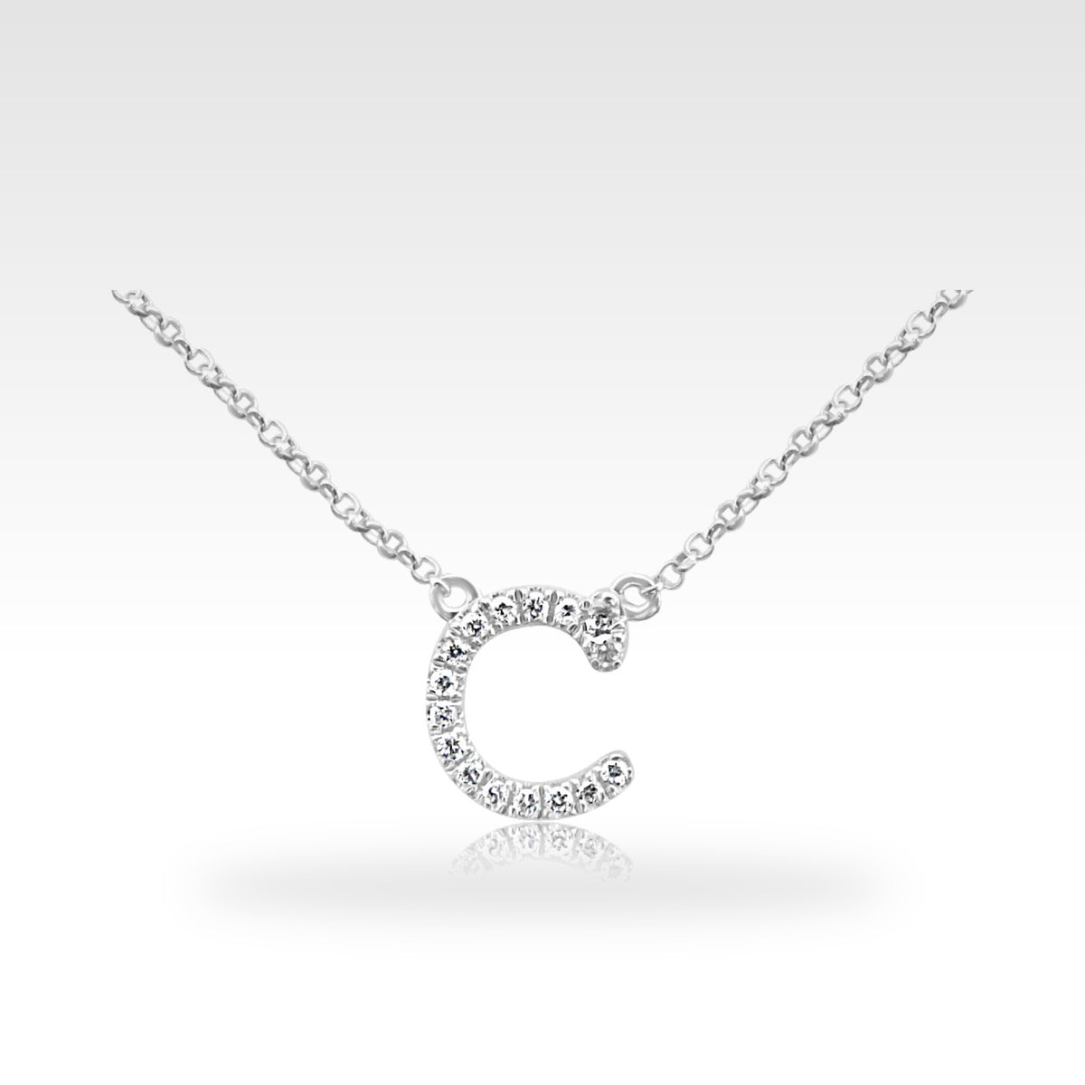 Small 'c' Pendant in 18ct white gold