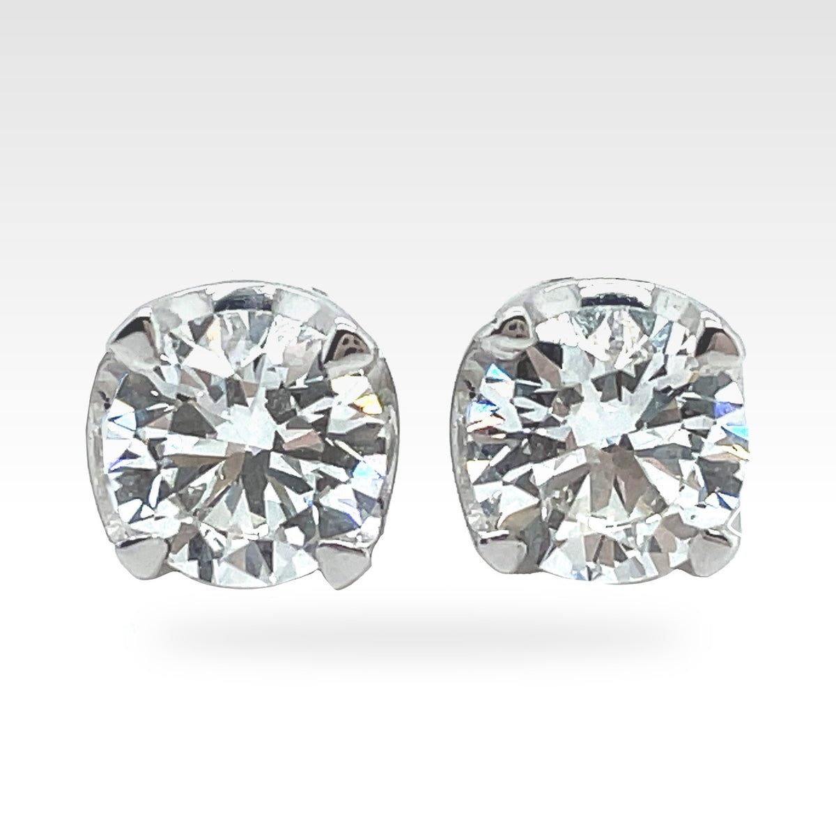 Regal Round Diamond Stud Earrings in 18ct white gold