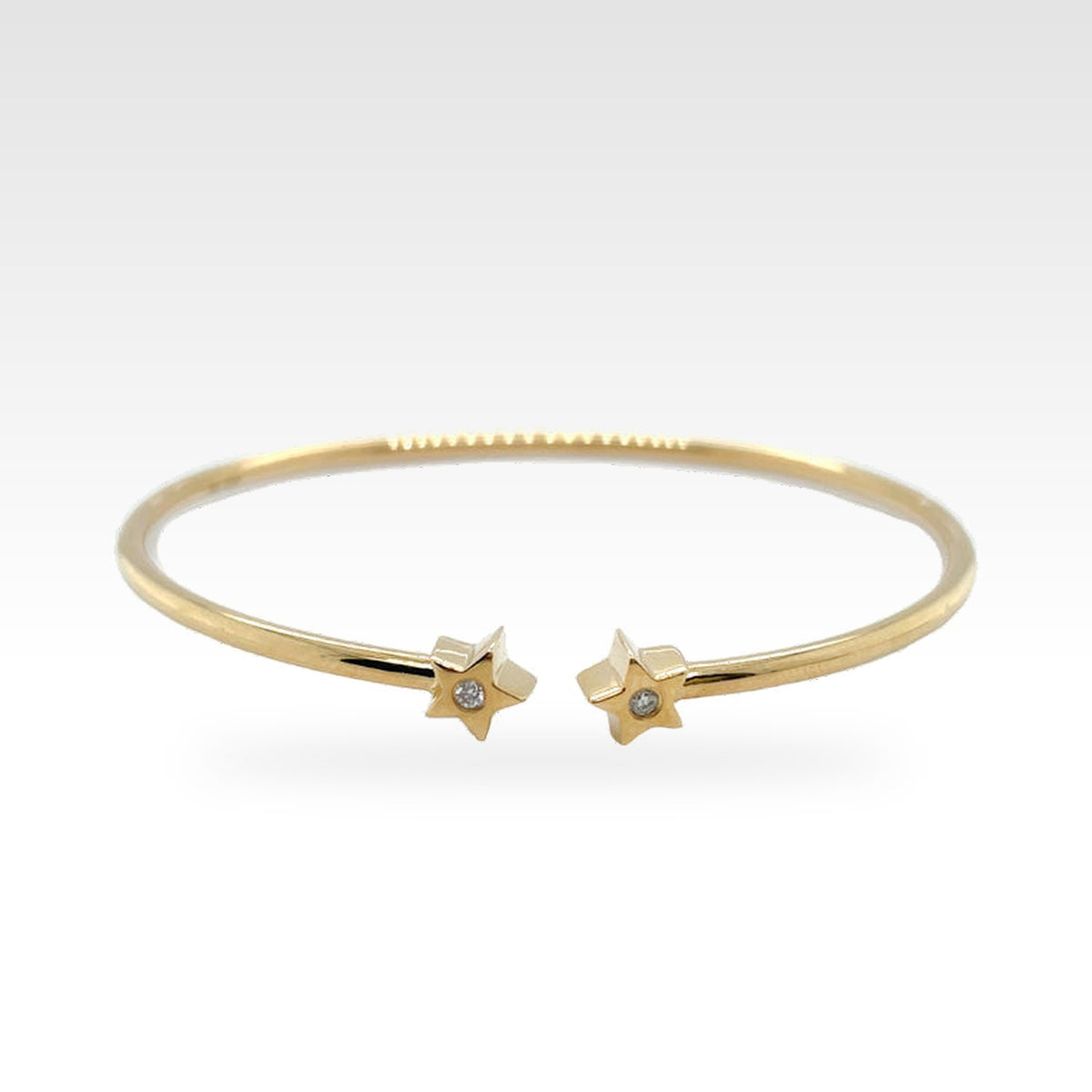 Star Baby Bangle in yellow gold with diamonds