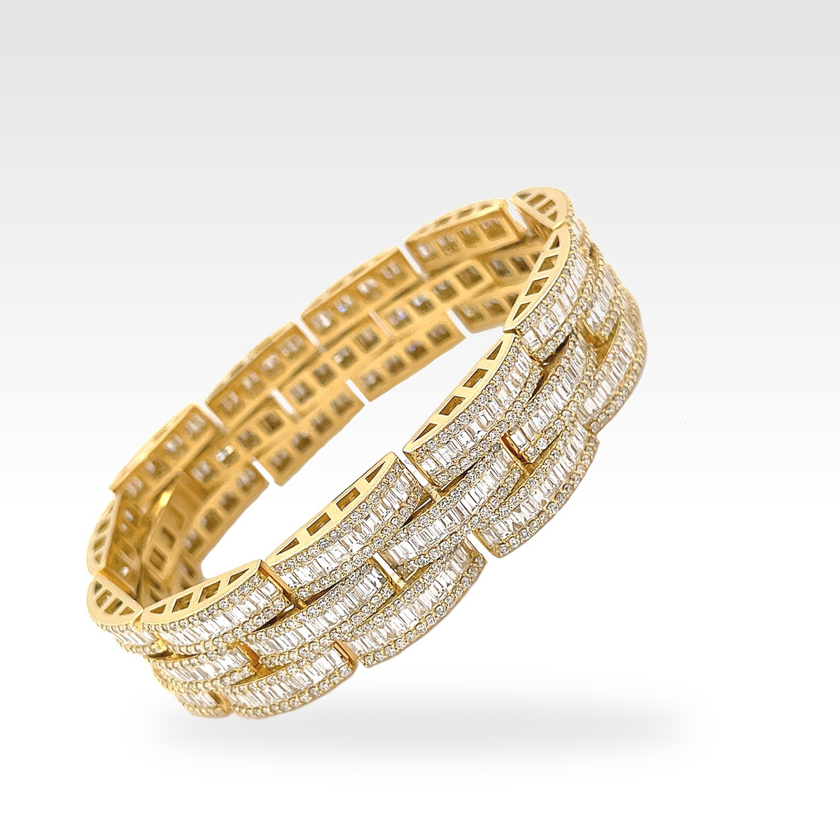 Baguette 18ct 3 Line Bracelet in 18ct yellow gold with round diamonds