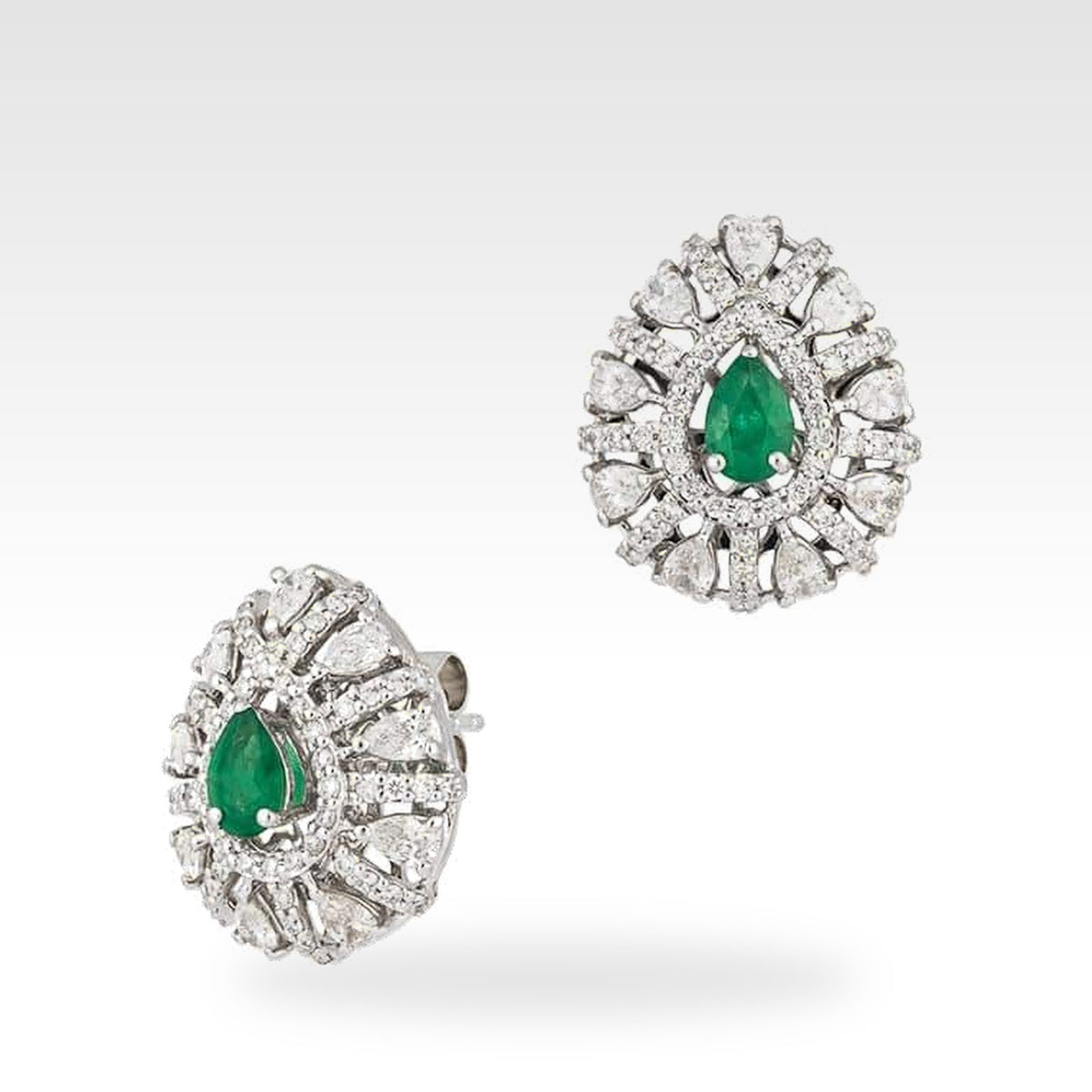 Art Emerald Pear Shape Halo Earrings in 18ct white gold with diamonds