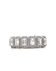 Anillo con halo de diamantes redondos y talla baguette de 1,3 quilates