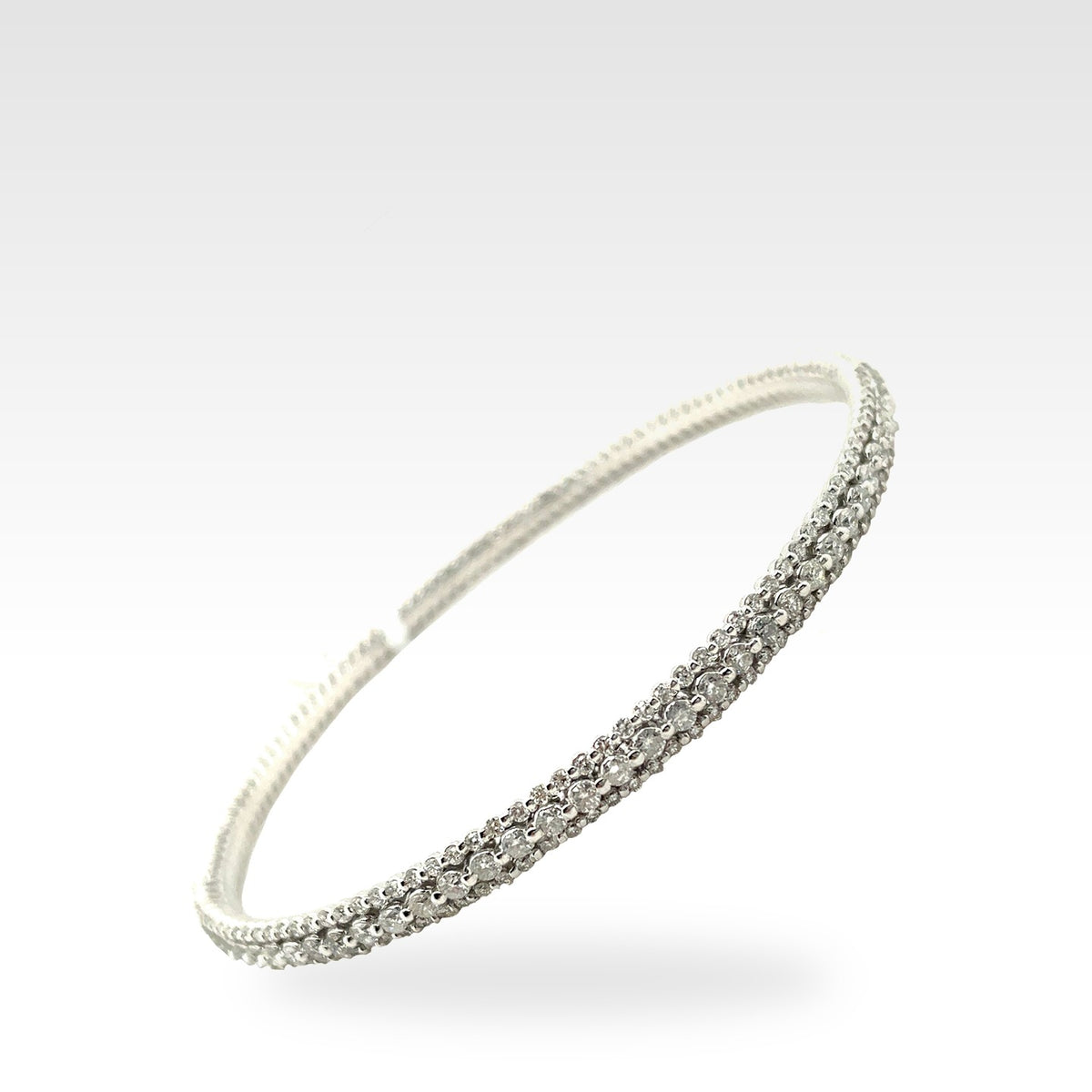 Regal Triple Row Bangle with round diamonds